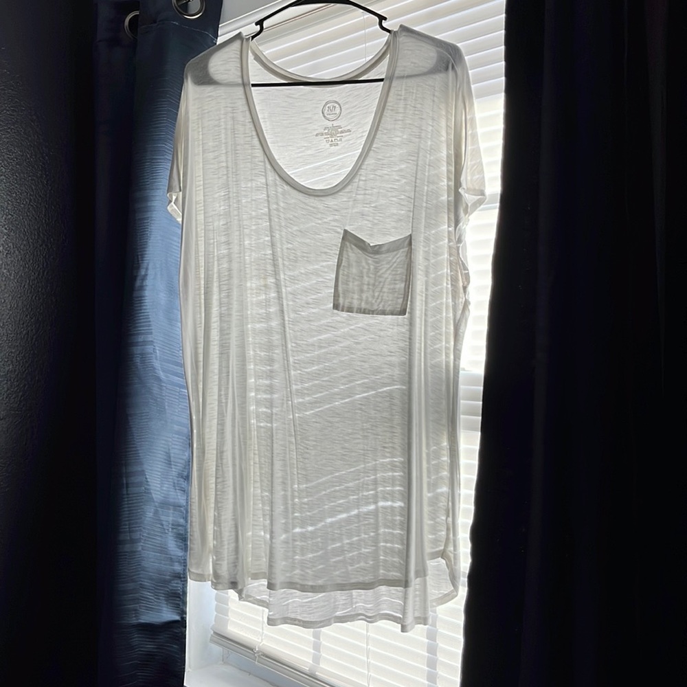 White Maurice’s 24/7 top. Size 2. Small stain, shown in photo